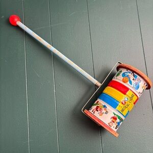 Vintage 1950 Fisher-Price Musical Chime roller toy with nursery rhymes